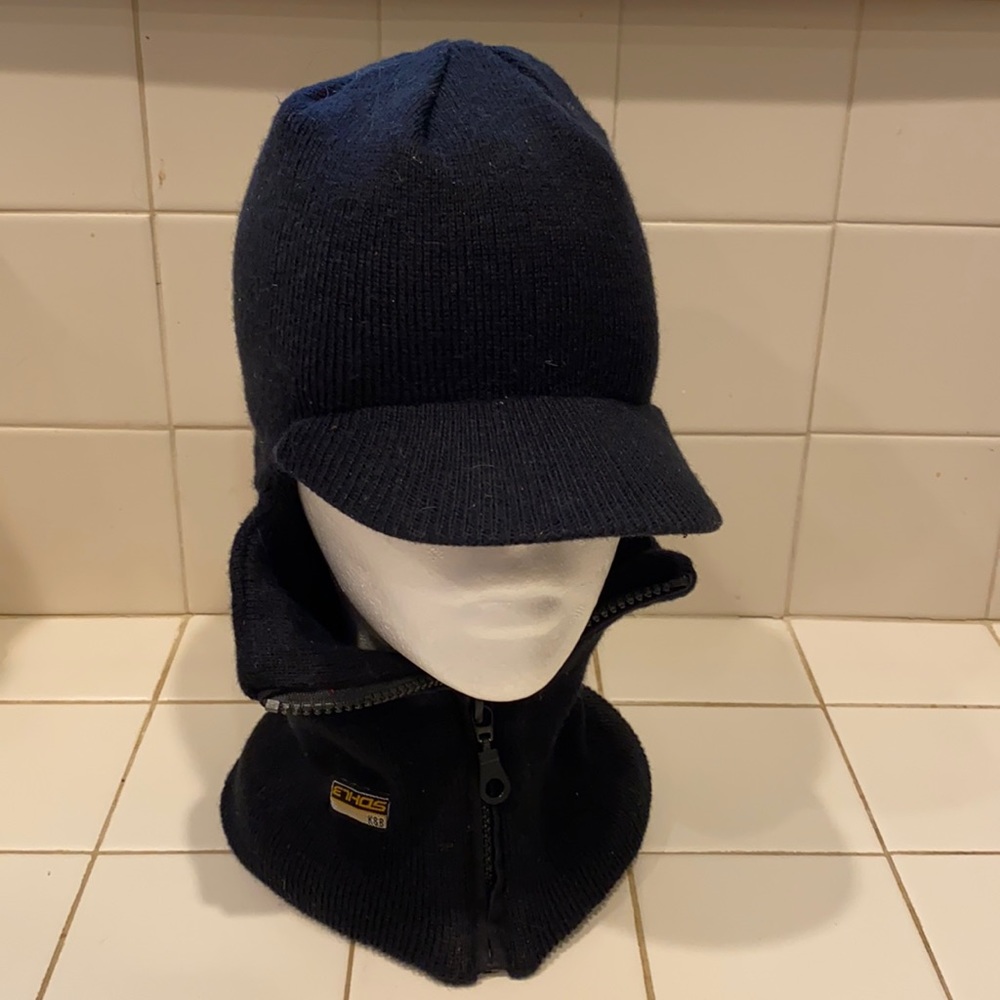 Black K & B winter hat with visor, in good condition